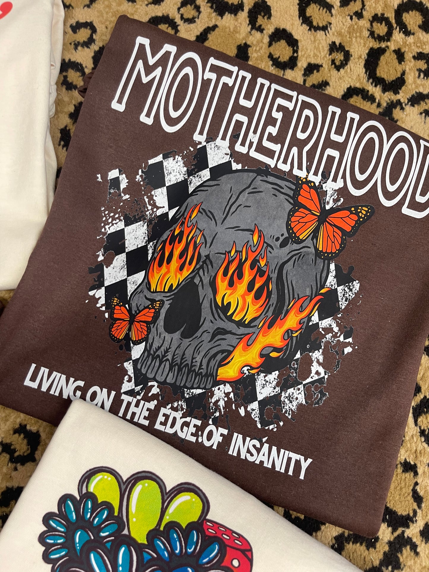 LIVIN ON THE EDGE OF INSANITY TEE